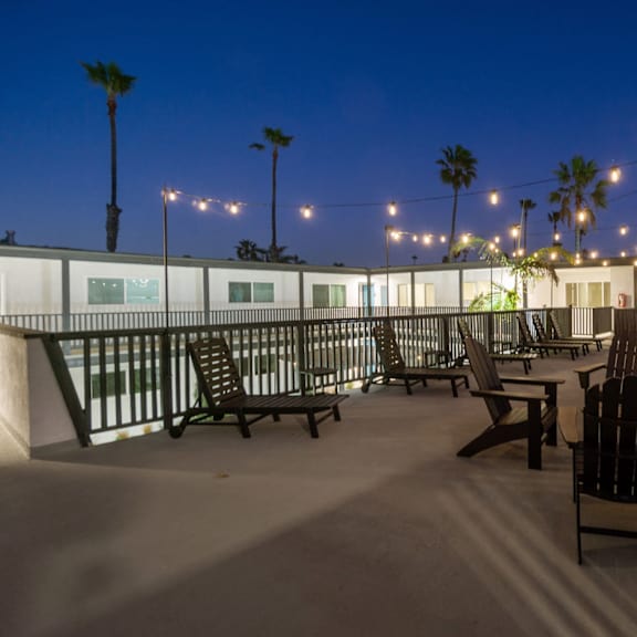 deck at sunset at ocean breeze terrace apartment, huntington beach, 92648