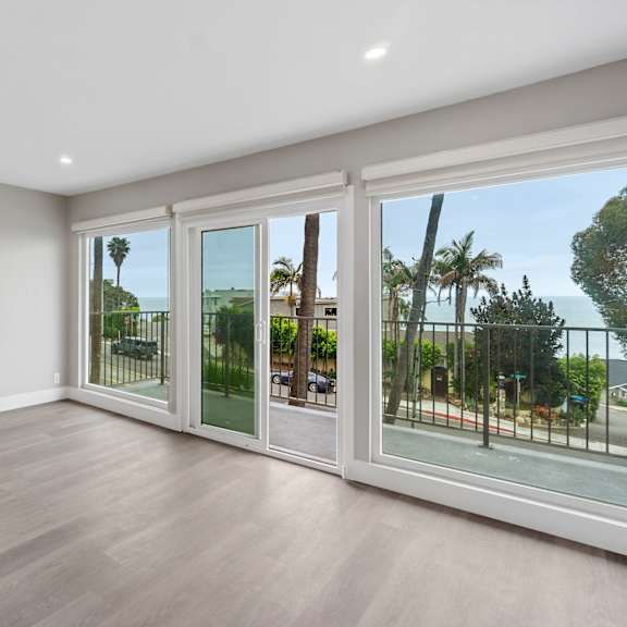 living area with balcony at ocean edge @ laguna beach, california, 92651