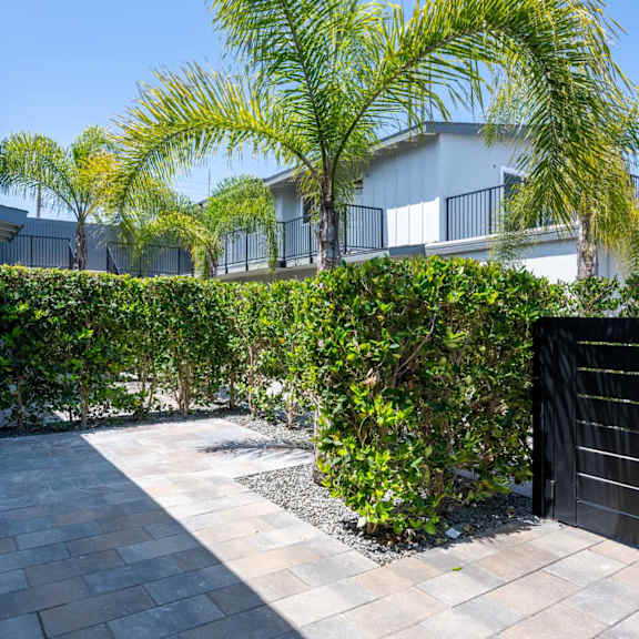 front gate of property at eastside haven at 17th apartments, costa mesa, ca, 92627