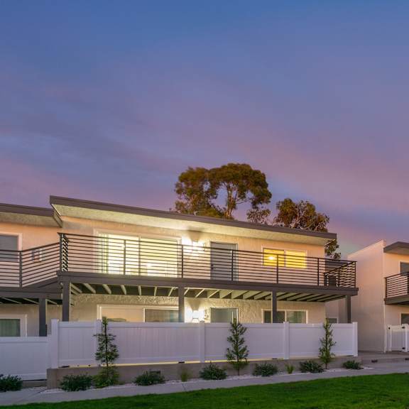 a view of the back of the house at sunset at seaview terrace apartment homes, california