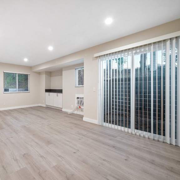 unfurnished living area at sunset cliffs apartments, vista, california