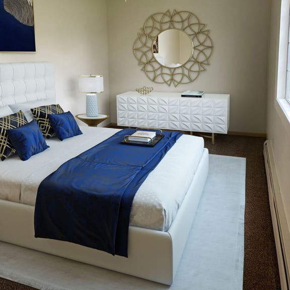 a bedroom with a bed and a ceiling fan