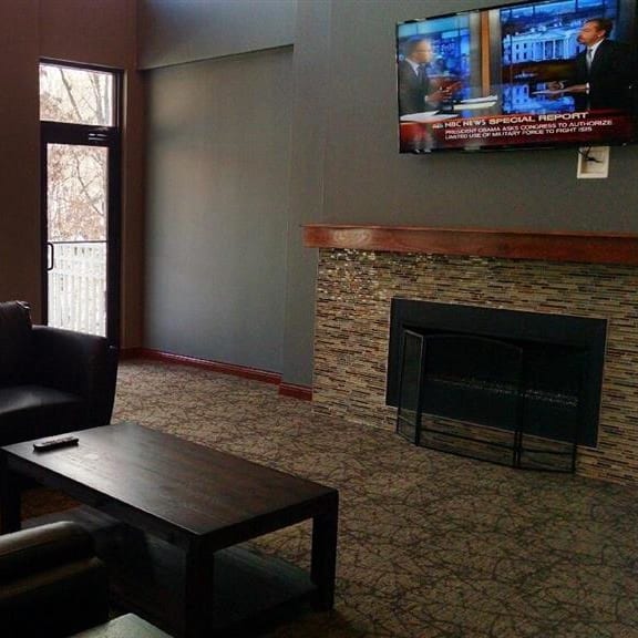 a living room with couches and a coffee table