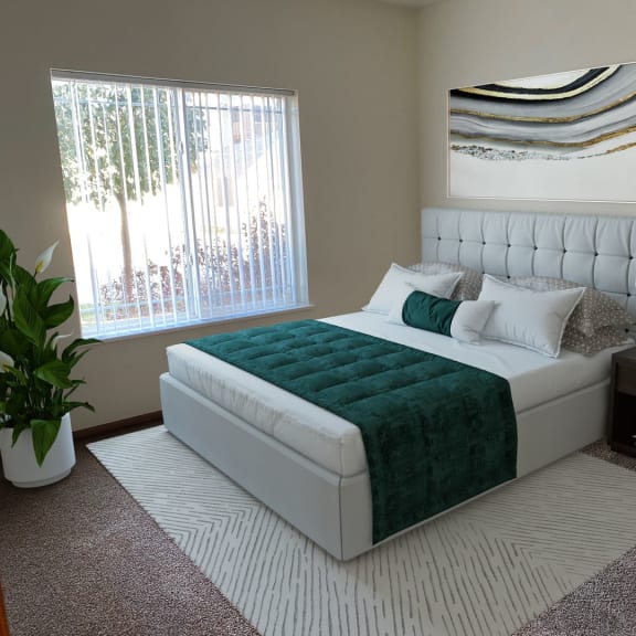 a bedroom with a bed and a window