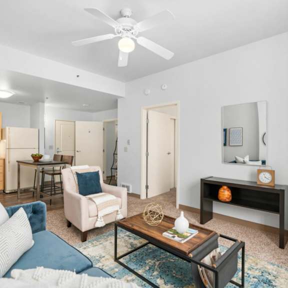 living room with kitchen at pacific tower apartments, portland