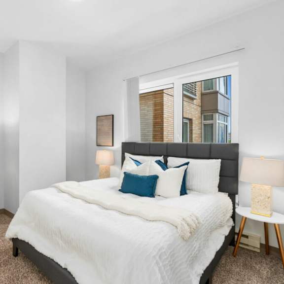 comfortable bedroom at pacific tower apartments, portland, or
