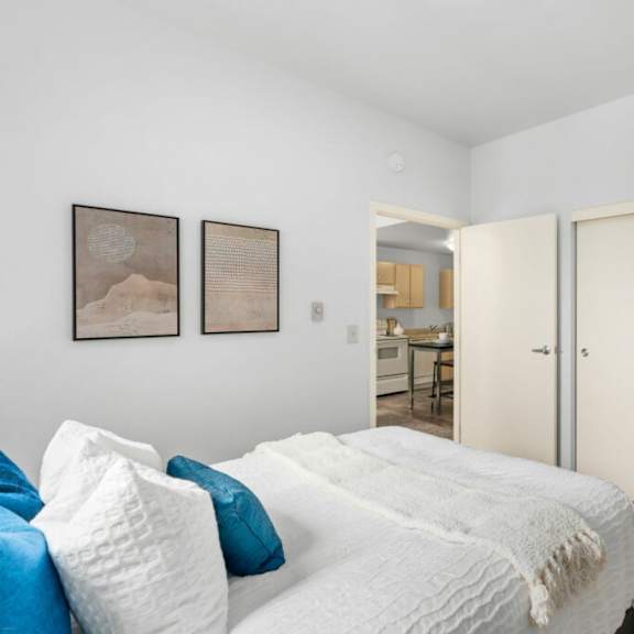 white bedroom at pacific tower apartments, portland, 97209