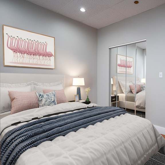 a bedroom with a large bed and a framed picture of a menorah on the wall.
