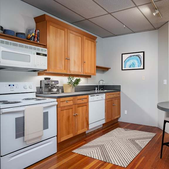 a kitchen with a table and chairs.