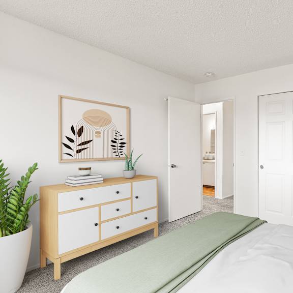 white bedroom with a bed at garden villa apartments, portland, 97266