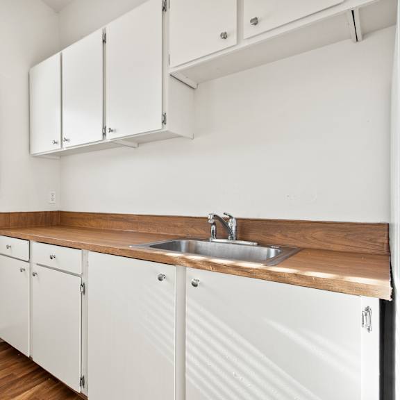 kitchen with ample storage at garden villa apartments, portland, 97266