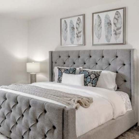 comfortable bedroom at alder creek apartments, washington