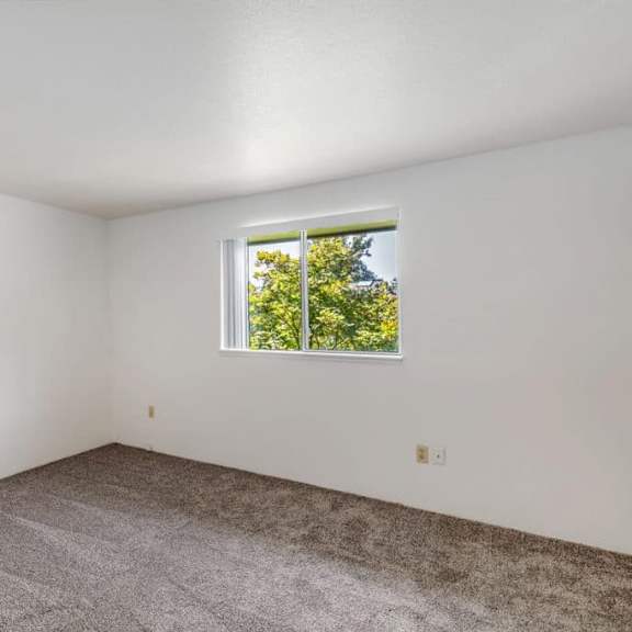 carpeted bedroom at alder creek apartments, vancouver
