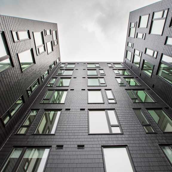 a view of a tall building from the ground at analog tacoma, tacoma, washington