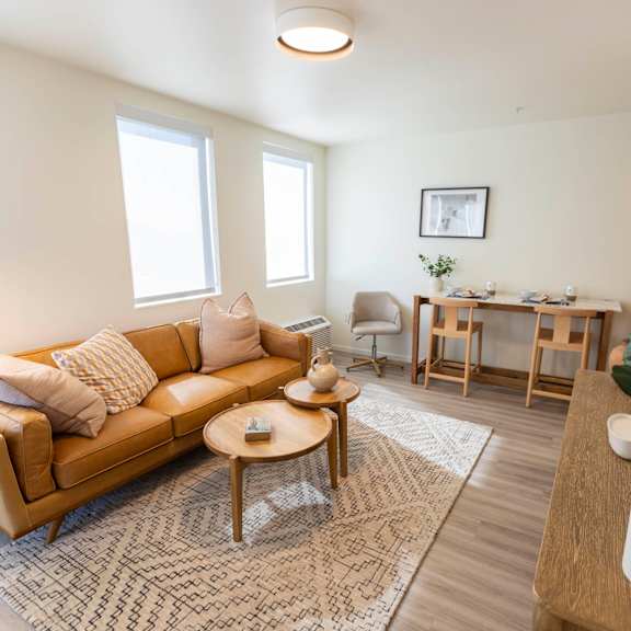 a living room with a couch and a table at moraine, tacoma, wa 98402