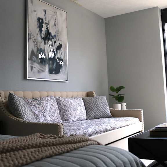 a living room with a couch and a bed at schaefer ridge apartments, branson , missouri
