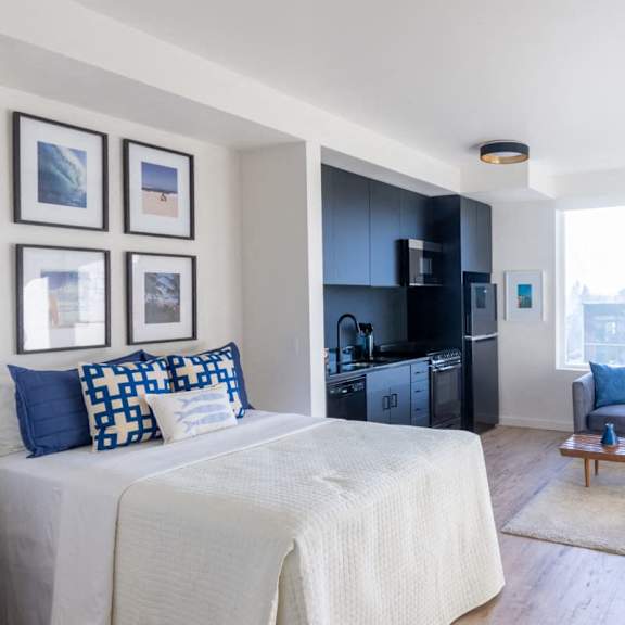 staged bedroom at nomad apartments, portland, oregon