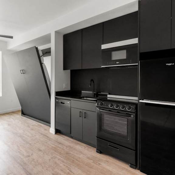 black appliances at nomad apartments, portland