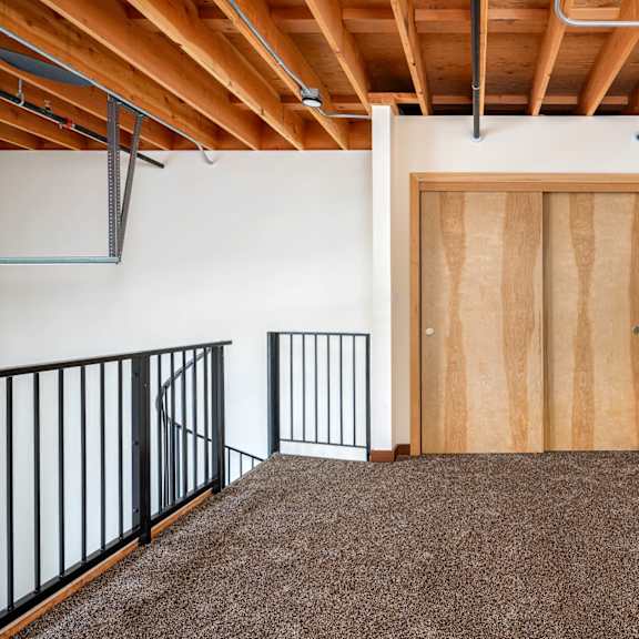 open space with black railing at atomic orchard experiment, portland, or, 97232