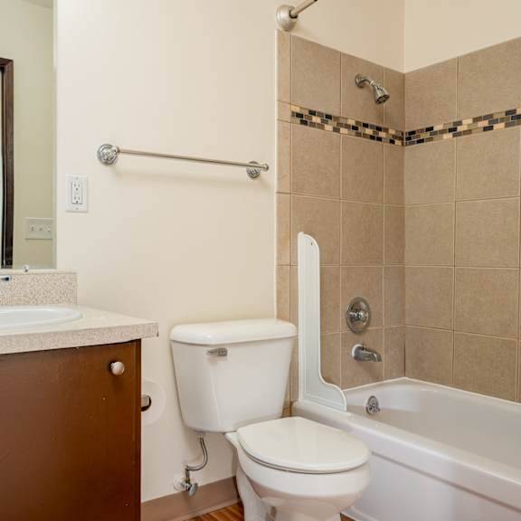 bathroom with a toilet at garden villa apartments, portland, 97266