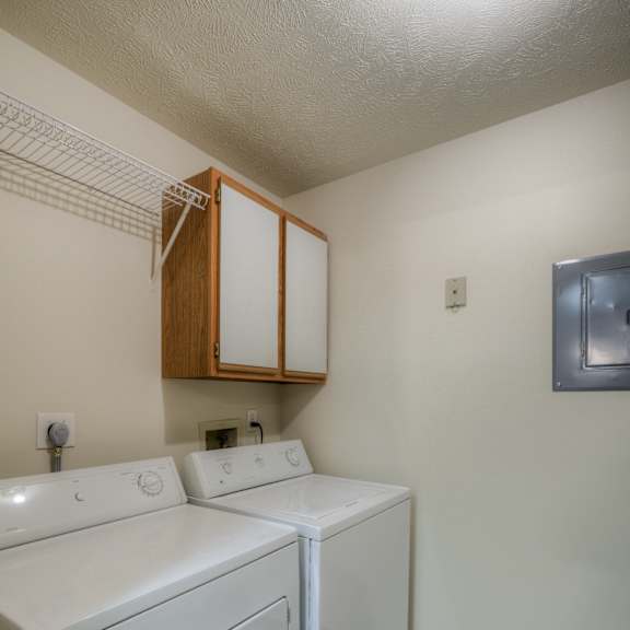 a laundry room with a washer and dryer.