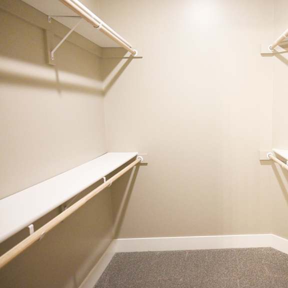 a small, empty room with a carpeted floor and white walls.