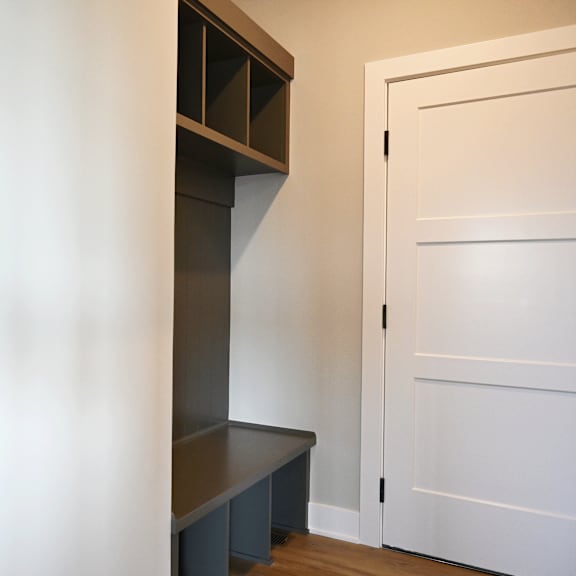 a white door is on the right side of the image.