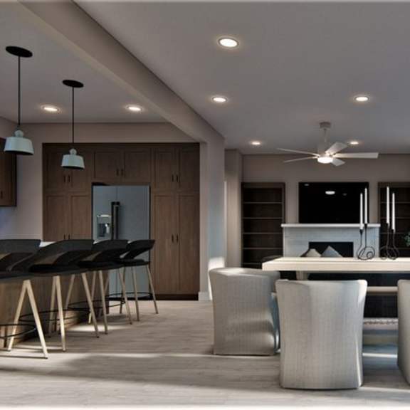 a modern dining room with a large table and chairs.