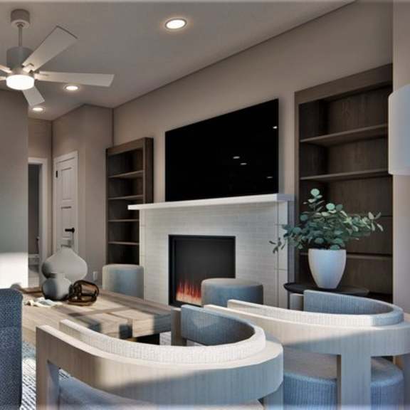 a modern living room with a grey sofa and a fireplace.