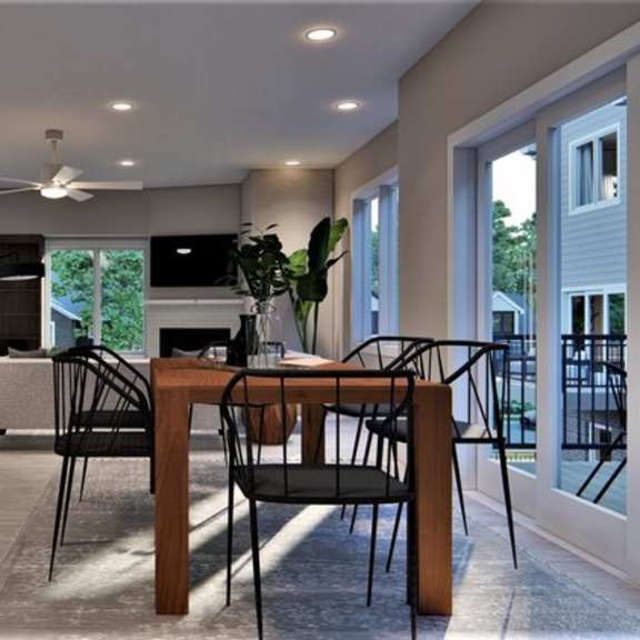 a modern living room with a dining table and chairs.