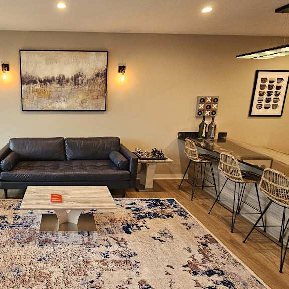 a living room with a couch and a coffee table