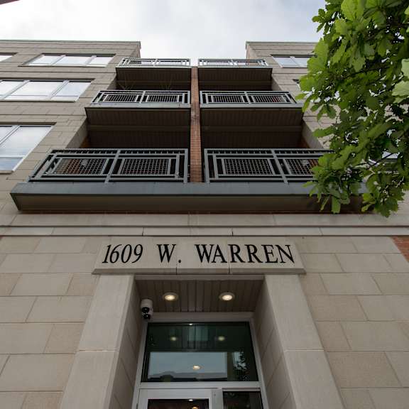 the front of the building of 160 w warren is shown at tripp 4321, chicago, 60641