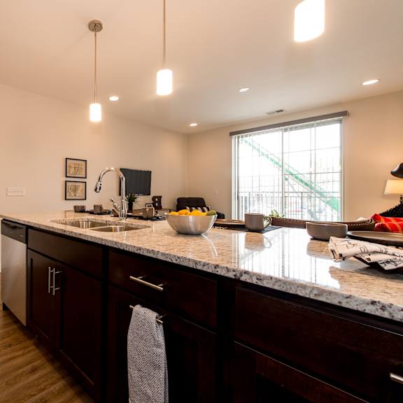 a kitchen with a counter top and a sink