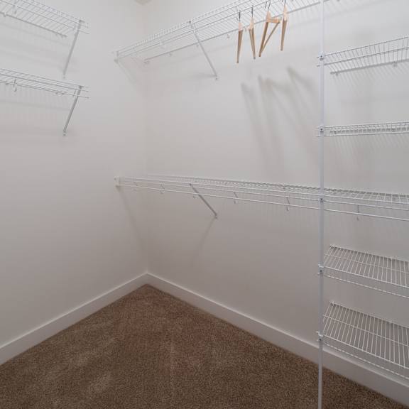 the view of a room with white lines on the wall