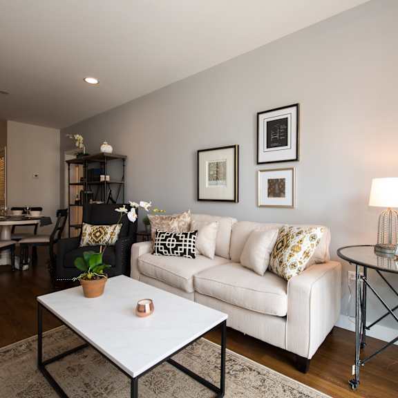 a living room with a couch and a table