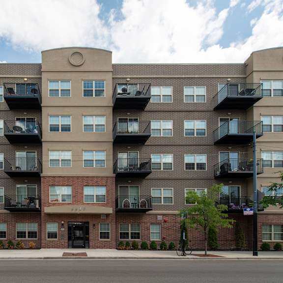 a large apartment building on a city street  at kedzie 4447, illinois