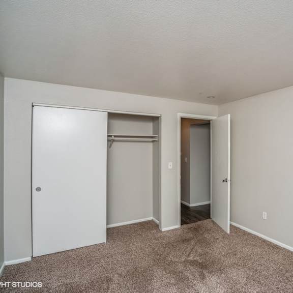 bedroom with plush carpeting at 1190 s bellaire st in denver, co