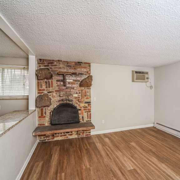 living room with nice wood-like flooring at 136 s penn in denver, co
