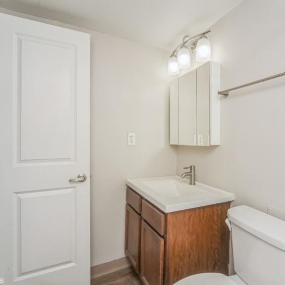 bathroom with vanity storage at 136 s penn in denver, co