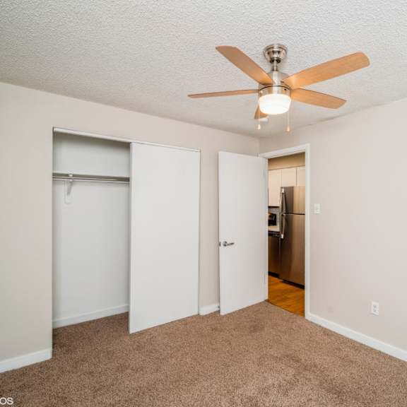 spacious bedroom with fan at 1443 elizabeth