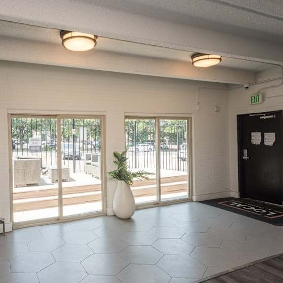 plenty of natural light in the modern clubroom at 1190 s bellaire st in denver, co