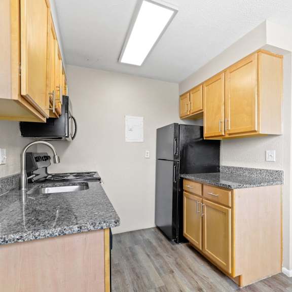 cook in style with sleek granite countertops at 1190 s bellaire st in denver, co
