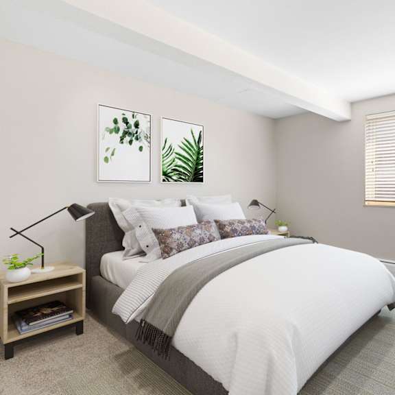 this cozy bedroom offers plush carpeting, soft natural light, and space to unwind in comfort at 1190 s bellaire st in denver, co