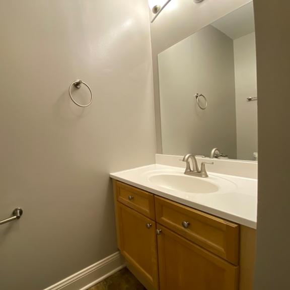 bathroom with vanity storage - two bedroom