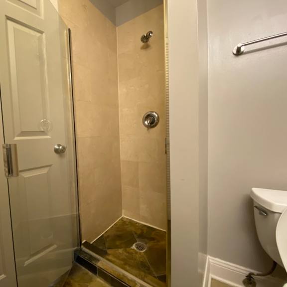 bathroom with a shower - two bedroom