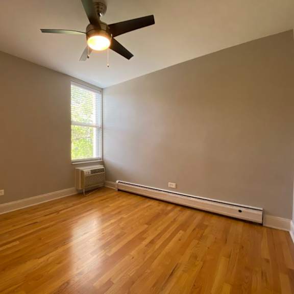 bedroom with a ceiling fan - two bedroom