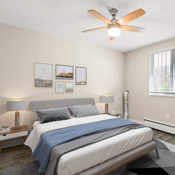 bright bedroom with large window, ceiling fan, queen bed, and modern decor on light walls at 1443 elizabeth in denver, co