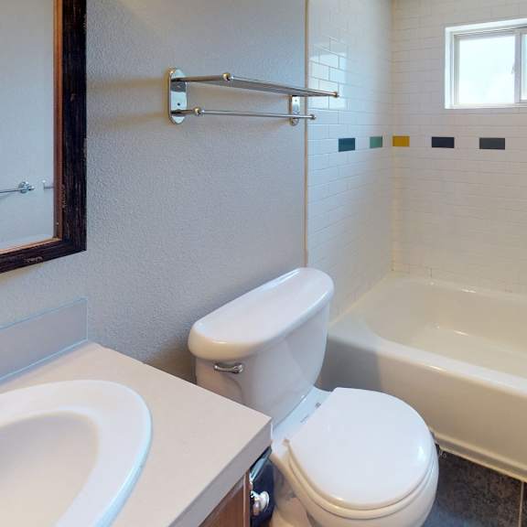 bright and white bathroom at 1443 elizabeth in denver, co