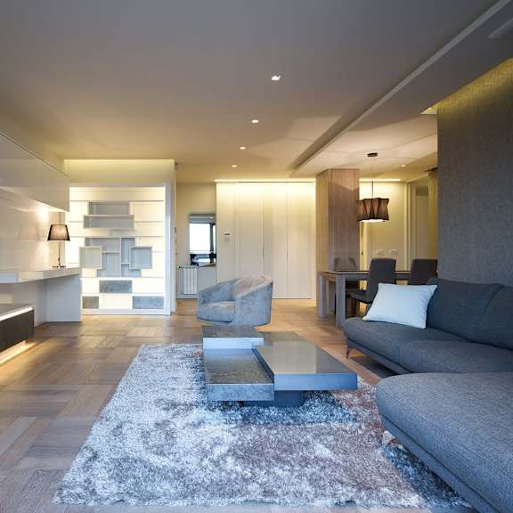a rendering of a living room with a couch and a coffee table