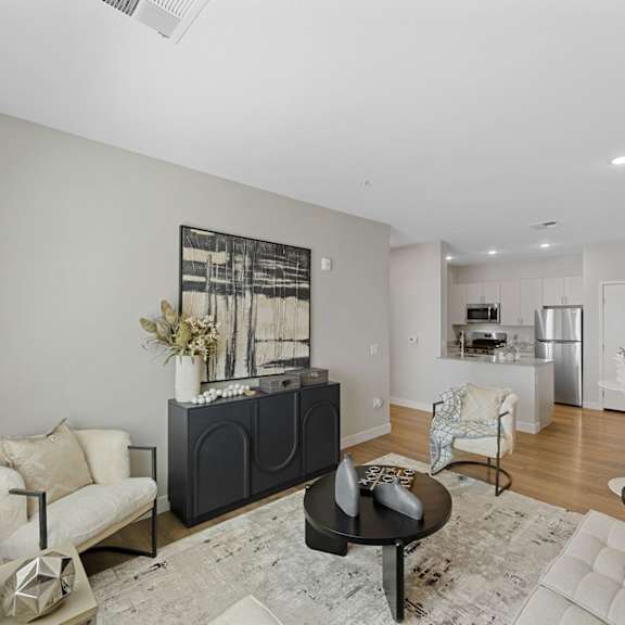 a living room with a black and white color scheme.